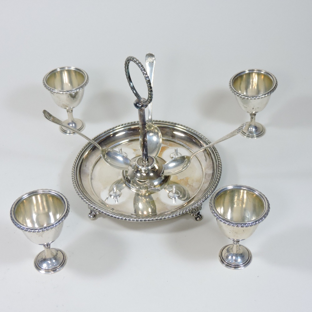 A Victorian silver egg cruet, of circular shape, fitted with four egg cups and four silver spoons, - Image 5 of 11