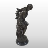 A bronze figure of a young lady,