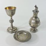 A Victorian silver travelling communion set, with engraved decoration, comprising a chalice,