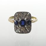 An 18 carat gold sapphire and diamond Art Deco style ring,