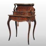 A 19th century French rosewood and amboyna boxwood strung bonheur du jour, with gilt metal mounts,