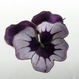 A Norwegian silver and purple enamelled brooch, of floral design, by David Andersen, stamped marks,