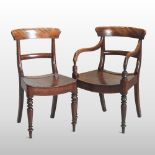 A set of eight Regency bar back dining chairs, each having a solid seat, on turned legs,