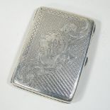 An Edwardian silver aide memoir, with engraved and engine turned decoration,