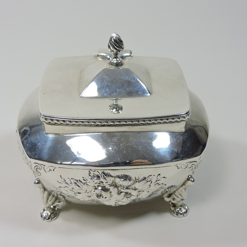 An early 20th century silver tea caddy, relief decorated with flowers, on paw feet, - Image 5 of 9