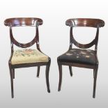 A set of four Regency carved mahogany dining chairs, each having a bar back,