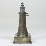 A rare Art Deco silver novelty table lighter, in the form of a lighthouse, with a hinged top,