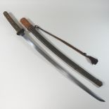 A 19th/20th century Japanese katana, having a bound fishskin grip,