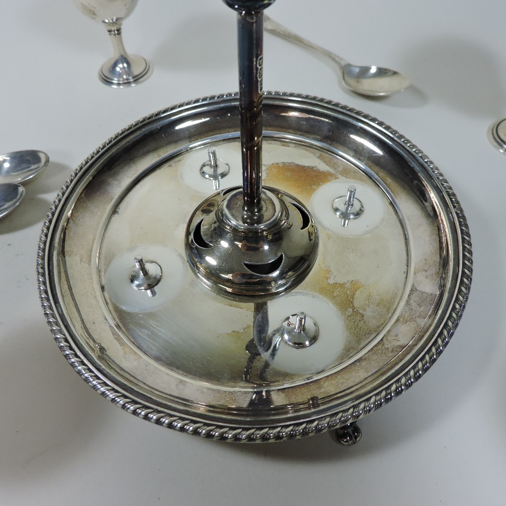 A Victorian silver egg cruet, of circular shape, fitted with four egg cups and four silver spoons, - Image 7 of 11