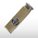 A 9 carat gold cigar cutter, with a steel insert,