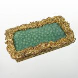 An ornate 19th century shagreen and gilt metal snuff box, with all over scrolled decoration,