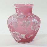 A 19th century opaque coloured glass vase, painted with white enamelled flowers and birds,