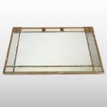 A 19th century carved and gilt gesso framed wall mirror, the rectangular plate,