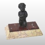 A 19th century bronze paperweight, in the form of a cherub,