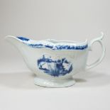 A Lowestoft porcelain blue and white sauce boat, circa 1770, of moulded shape,