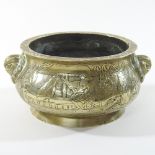 A Chinese gilt bronze censer, decorated to either side with Oriental figures in a boat,