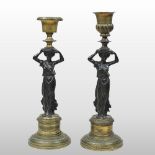 A near pair of 19th century Empire style bronze and gilt figural table candlesticks,