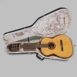 A Giannini Brazilian acoustic classical guitar, model AWN85, and dated 05 1974, 101cm long,