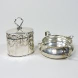 An Edwardian silver box and cover, in the form of a miniature Georgian tea caddy,