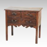 An 18th century mahogany and crossbanded lowboy, containing three drawers, on square legs,