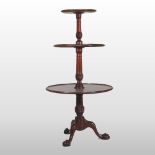 A George III style mahogany three tier dumb waiter, of large proportions, 162cm high,