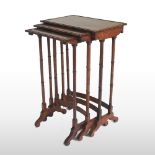 A nest of three Regency rosewood occasional tables, on slender turned legs,