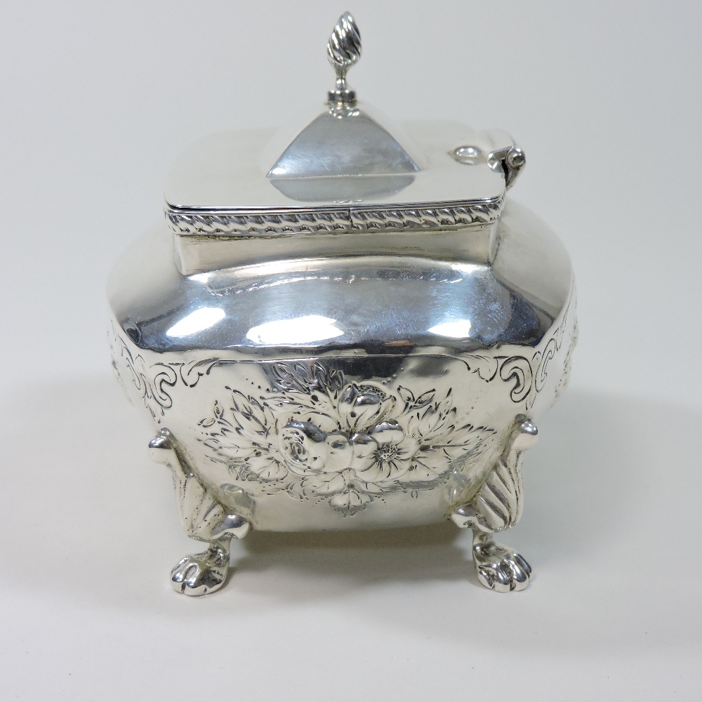 An early 20th century silver tea caddy, relief decorated with flowers, on paw feet, - Image 9 of 9