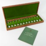 A set of twelve silver and gilt flower spoons, produced for The Royal Horticultural Society,