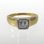 An 18 carat gold gentleman's single stone diamond ring, approximately 0.