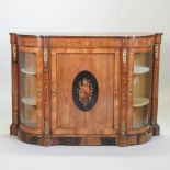A Victorian walnut, inlaid and gilt metal mounted credenza, the central panelled door,