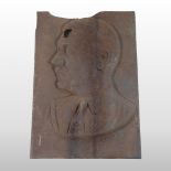 A cast iron portrait plaque, relief decorated with the head and shoulders of Adolf Hitler,
