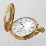 A Victorian 18 carat gold cased half hunter pocket watch, the white enamel dial signed Dent,