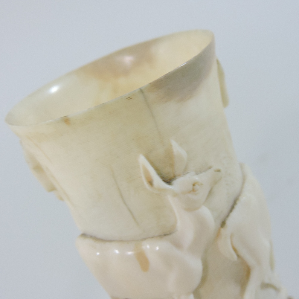 A 19th century German carved and turned ivory hunting cup, of slender form, - Image 3 of 9