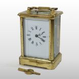 An early 20th century English brass cased carriage clock, of large proportions,