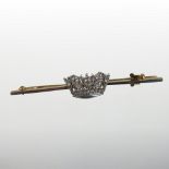 An 18 carat gold, platinum and diamond set bar brooch, set with a crown,