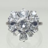 Withdrawn - A large bespoke made unmarked platinum and diamond cluster ring,