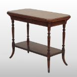 A Victorian amboyna and ebonised side table, of canted rectangular shape, on turned and fluted legs,