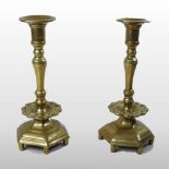 A pair of 19th century continental brass candlesticks,
