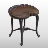 A carved and painted Venetian style stool, in the form of a scallop shell, on cabriole legs,