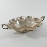 A Victorian silver twin handled dish, of lobed oval shape, inscribed Millar Wilkinson St.