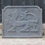 A cast iron fire back,