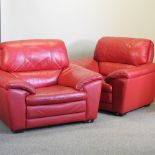 A pair of modern red leather upholstered armchairs,