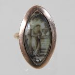 A George III sepia mourning ring, of elliptical shape painted with a figure weeping before a well,