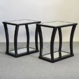 A pair of modern side tables, with mirrored inset tops,