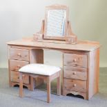 A Marks and Spencer pine dressing table, 143cm,