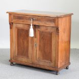 An early 20th century continental walnut side cabinet,