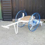 An early 20th century Dairy Supply Company London painted hand cart, with a slatted wooden tray,