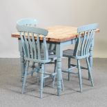 A pine kitchen table, on blue painted legs, 105 x 74cm,