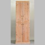 A pine hall cupboard,