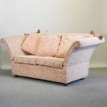 A peach floral upholstered knole sofa,